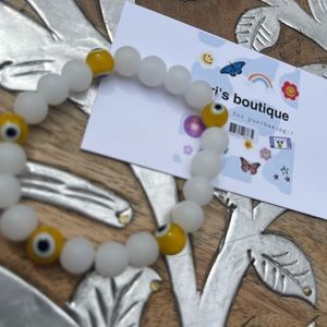 Yellow evil eye bracelet😊